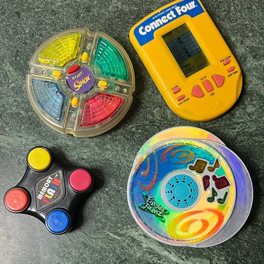Simons Colorful Memory Game Set all hand held size. - Picture 1 of 2